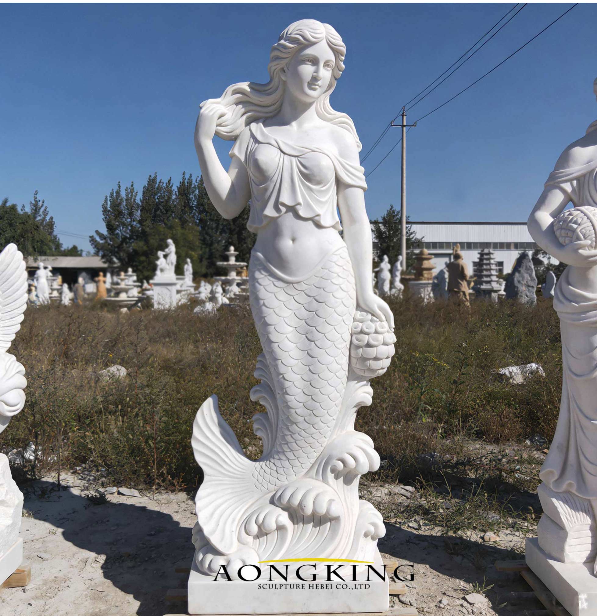 hand carved stone mermaid statue