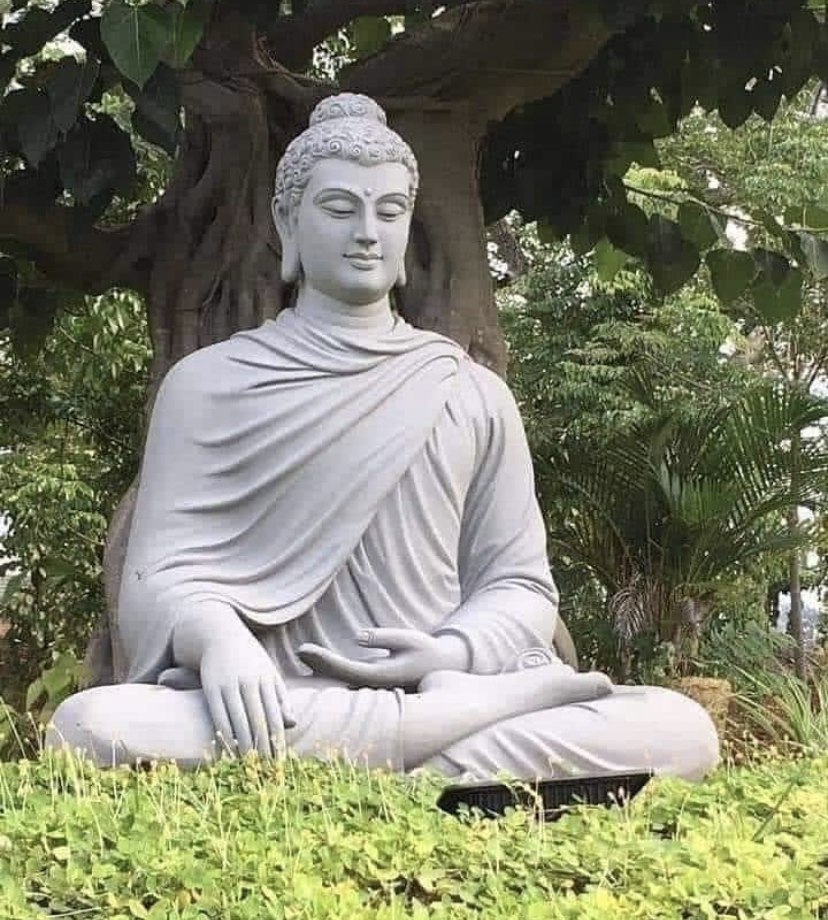 stone buddha statue in garden