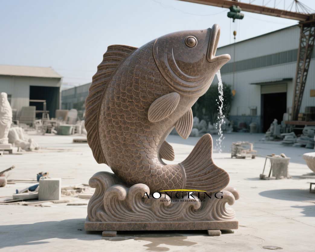 stone water fountain with fish statue