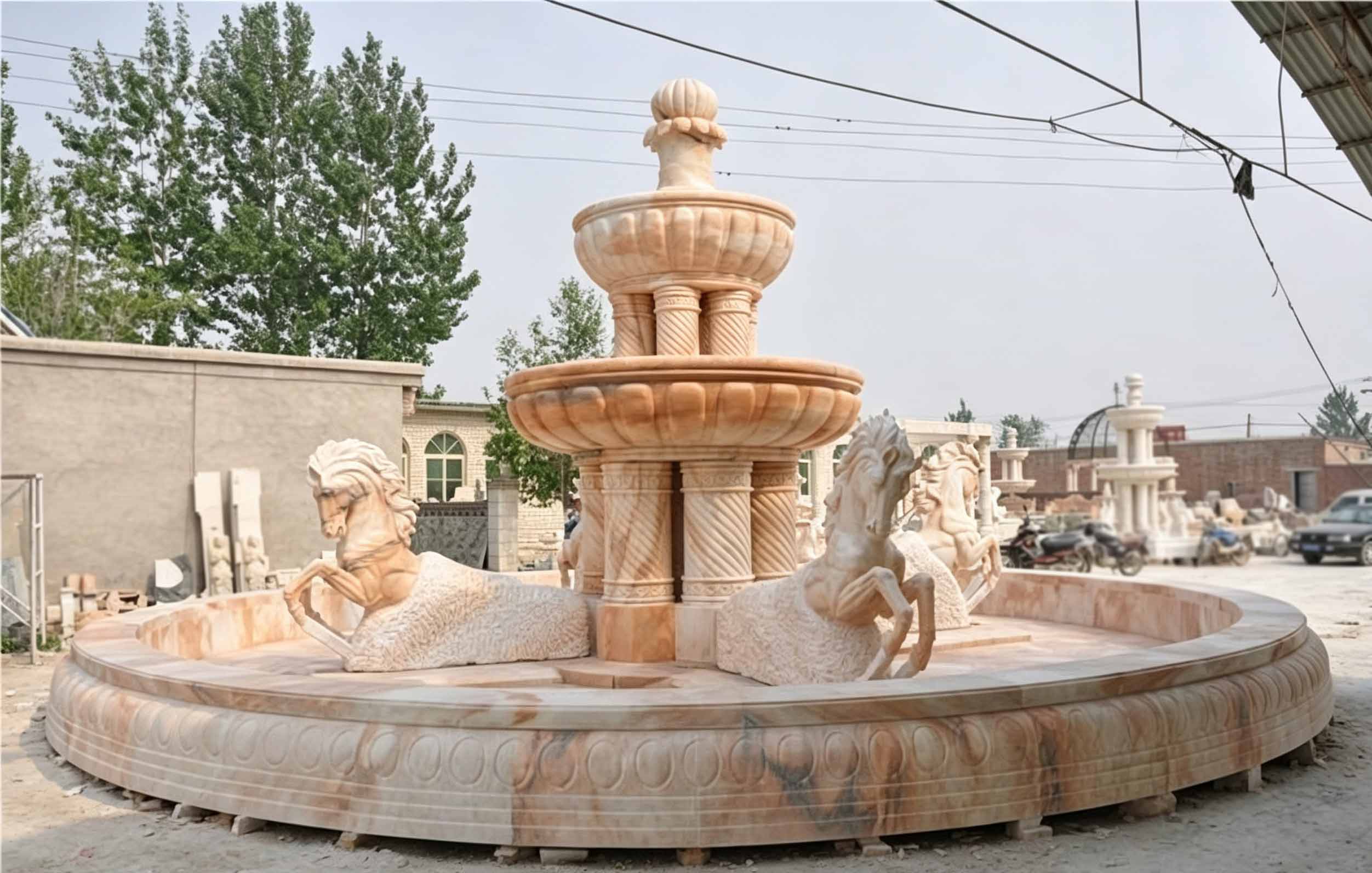 Large marble two tiered water fountain outdoor with horse sculptures
