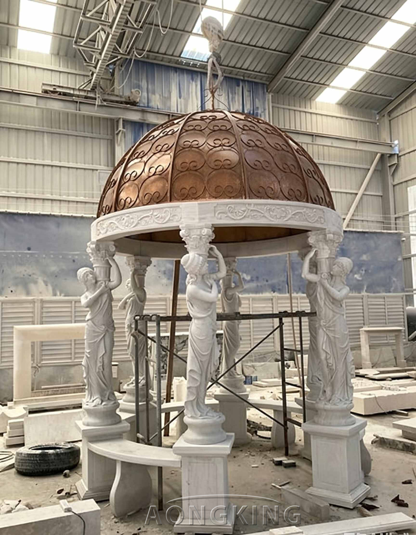 marble gazebo with statues