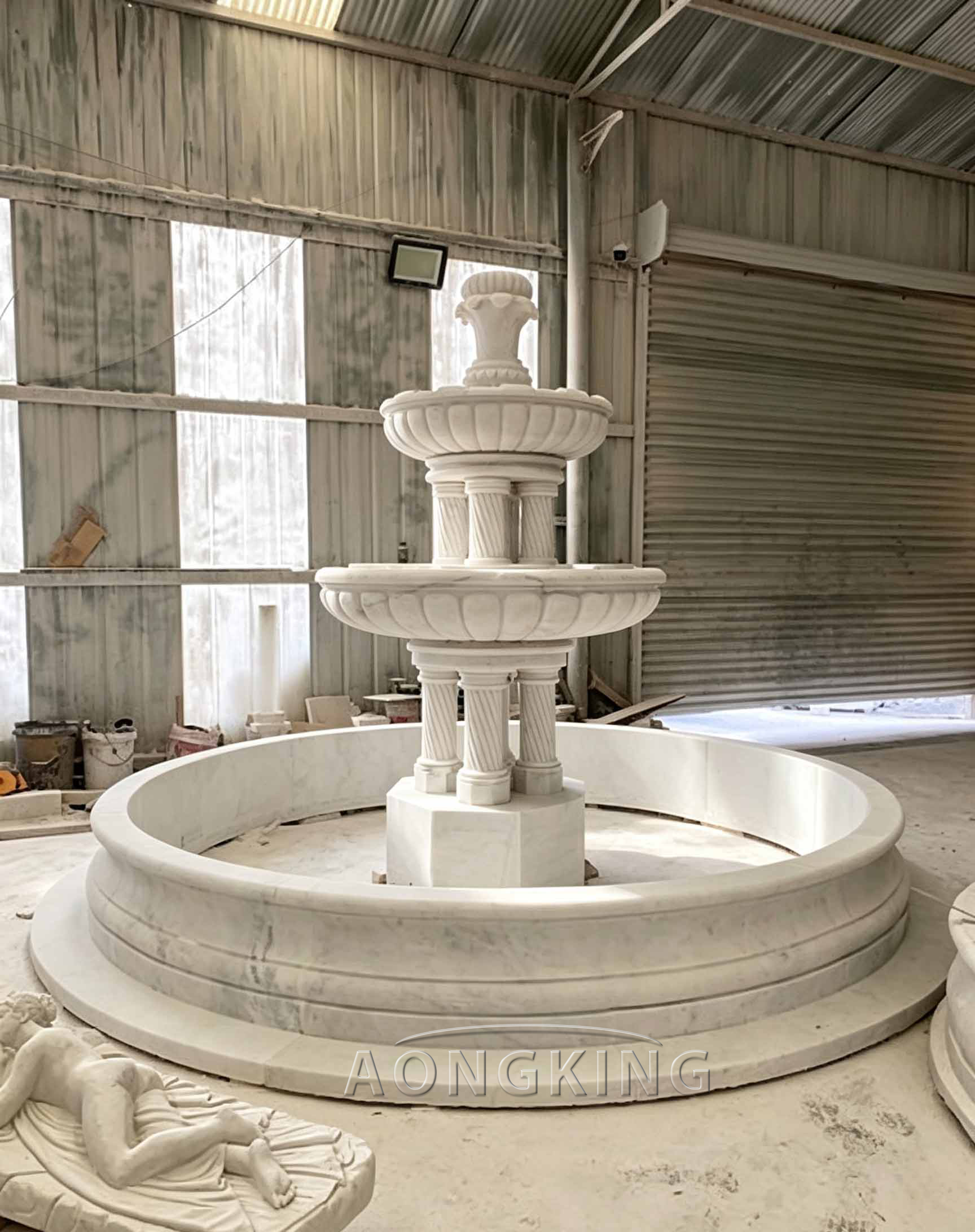 white marble large stone fountain